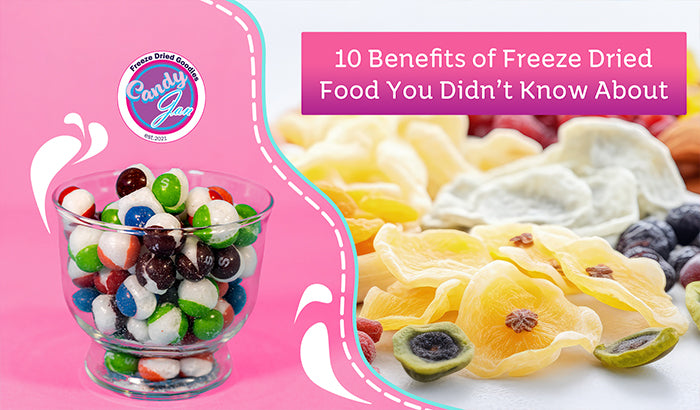 Colorful glass bowl filled with freeze-dried candy on a pink background next to an assortment of freeze-dried fruits